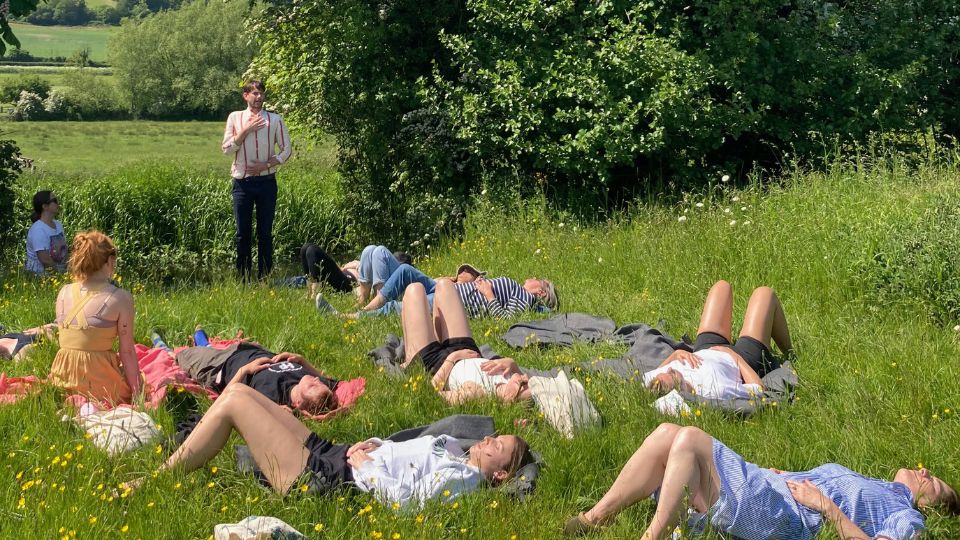 Tom facilitating a breathwork session outdoors in nature